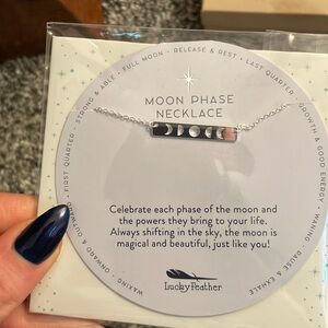 BNWT sterling silver moon phase necklace.
